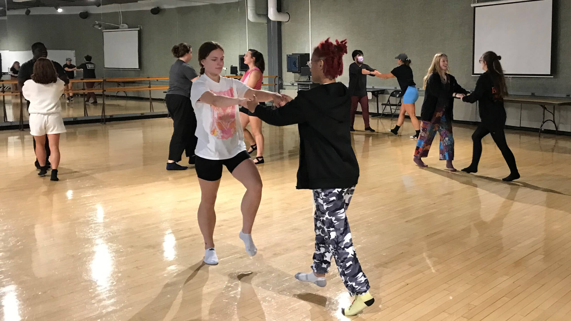 students dancing together